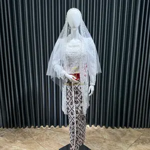 Sepasang Kebaya Akadnikah dan Beskap Jawa Model Namira dengan Desain Elegan dan Detail Bordir yang Menawan