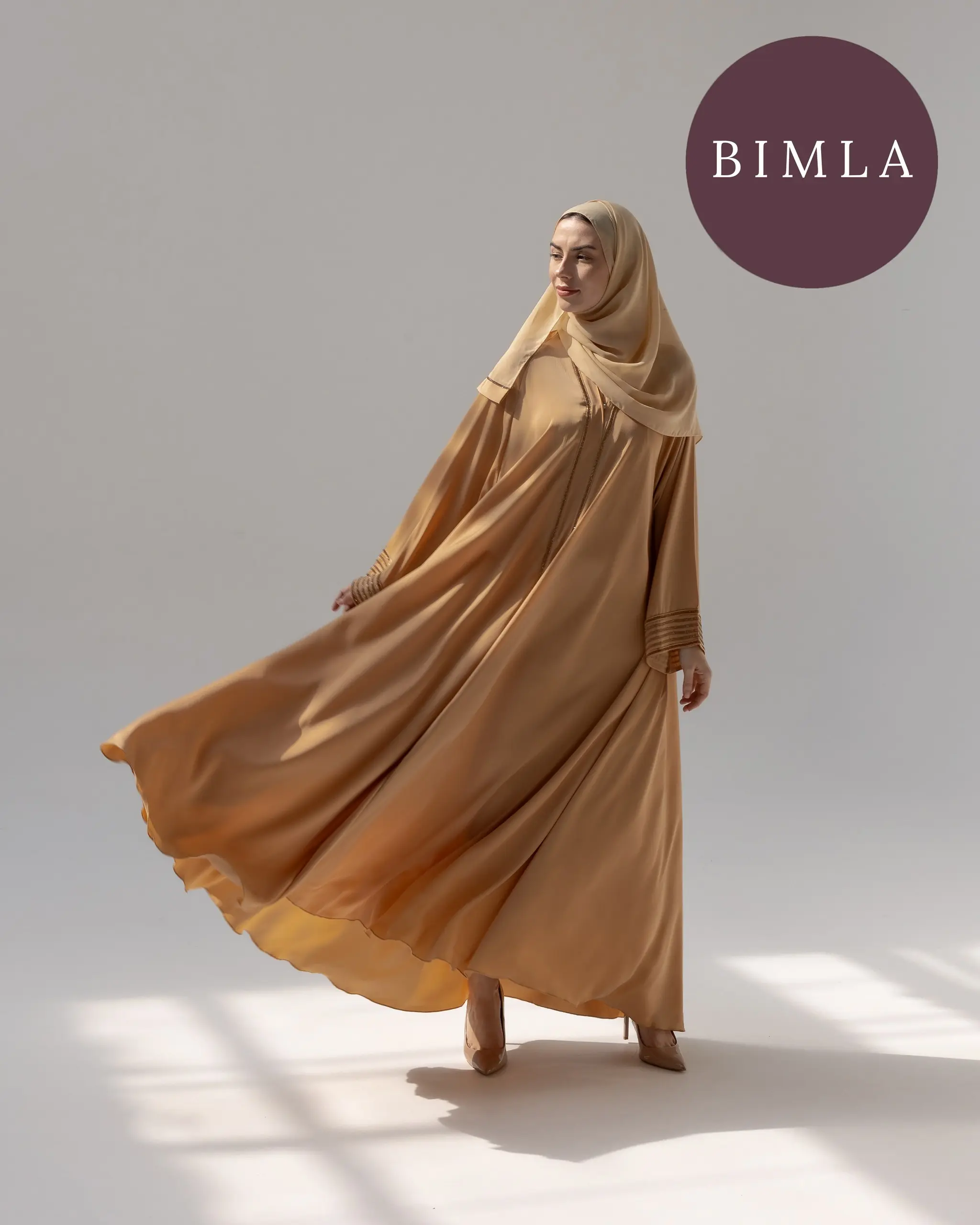 Golden Abaya with Simplistic Golden Work for Elegant and Sophisticated Look