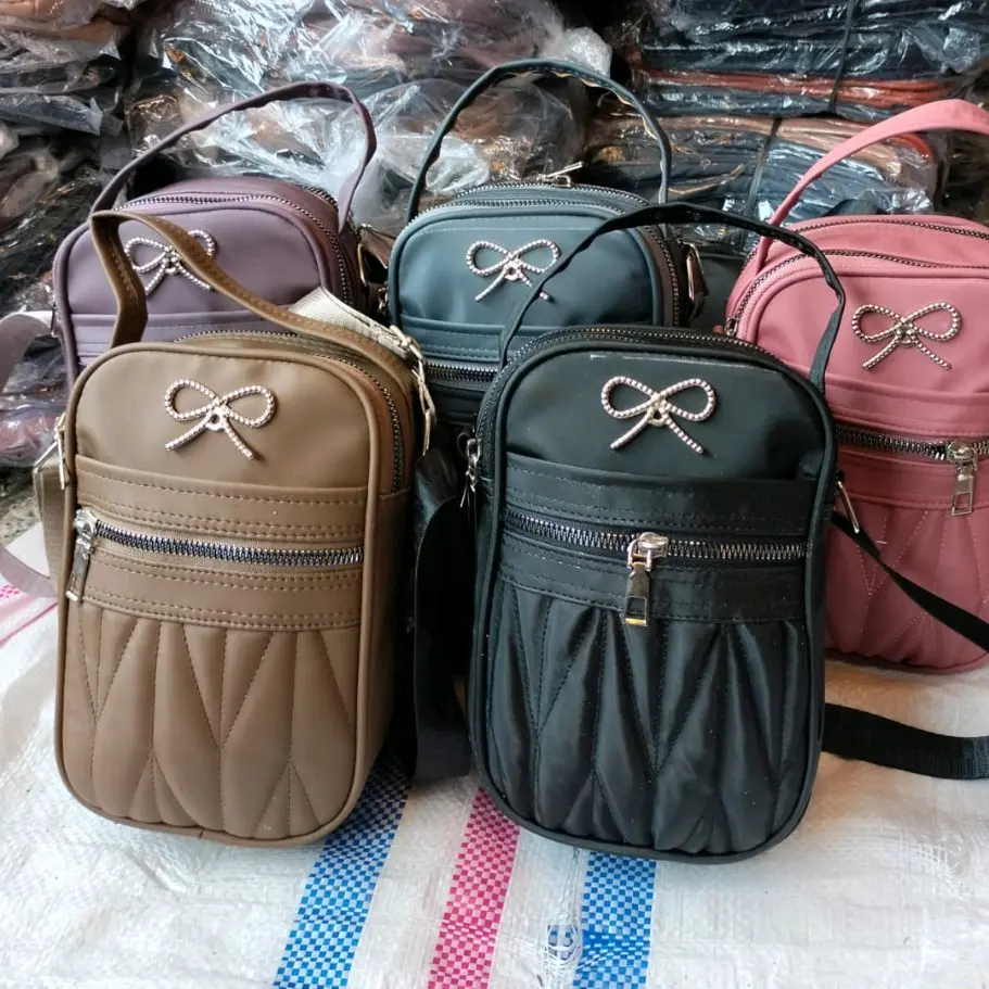 Tas hp wanita pita unik 4 ruang , CO di live harga murah. cocok untuk remaja dewasa, ibu,muat hp dan dompet