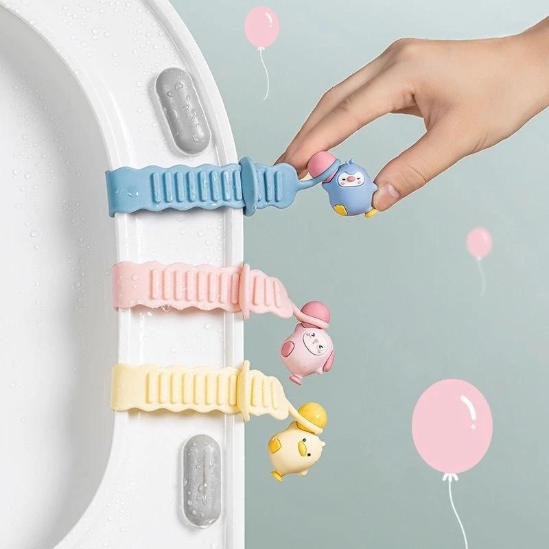 Kartun Toilet Lucu Toilet Seat Pegangan Bahan Silikon Warna Permen Anti Slip Toilet Lid Lifter
