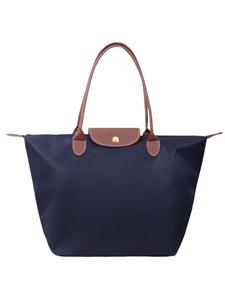 Bolsa tote de moda para mujer de gran capacidad, diseño casual versátil, bolsa de hombro para el trabajo y uso diario, bolsa de moda que combina con todo para commuters y viajeros