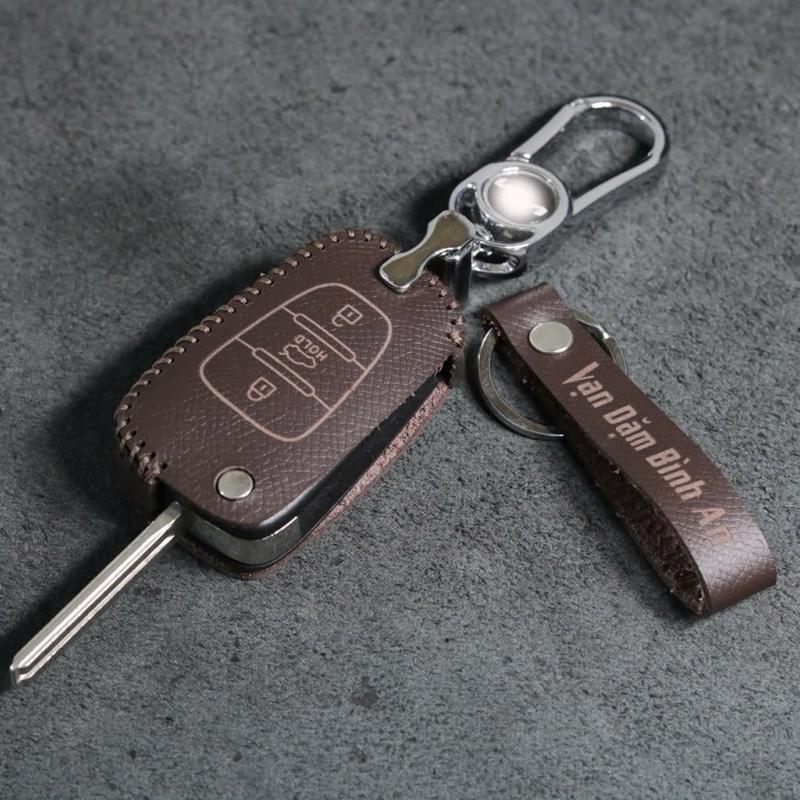 Bao da bọc ốp chìa khoá xe ô tô KI.A Carens KI.A Morning chìa gập 2 3 nút bấm da bò thật Móc Khoá Móc Khóa
