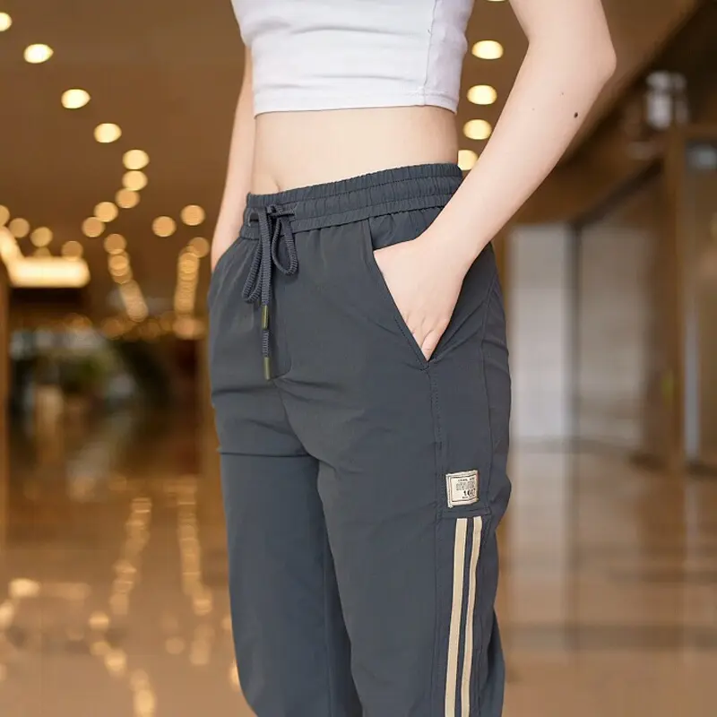 Summer thin men's casual pants with elastic waistband, cuffed legs for running, nine - point length, versatile for sports - 2025 men's trousers