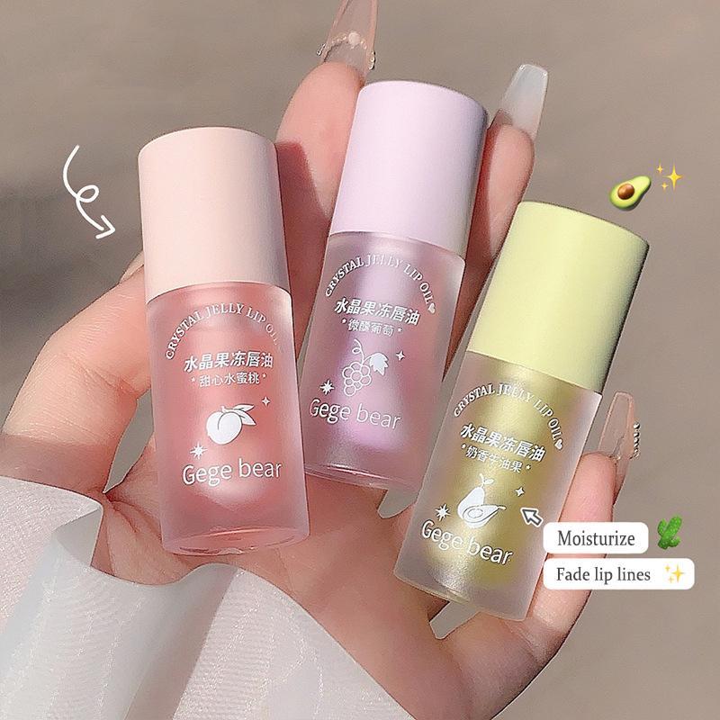 Product Introduction of Crystal Jelly Lip Oil Hydrating Plumping Lip Gloss Coat For Cute Makeup Lipsticks Tinted Clear Serum Fruit Lip Balm Cosmetics Peach Brush 40
