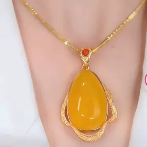 Baru tetes manik gantung kalung es kuning vintage rantai kunci high-end temperamen elegan hadiah liburan
