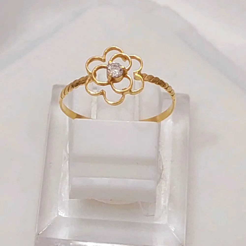 Cincin model kembang mata satu 0,5 gram