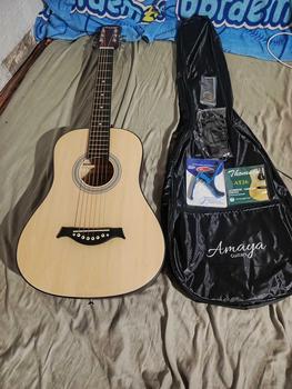 Product Review of Amaya GS Mini-1 with trussrod 36-inch rounded body with guitar bag, capo, strap, pick, extra 1 set of strings. from ** V**n 0