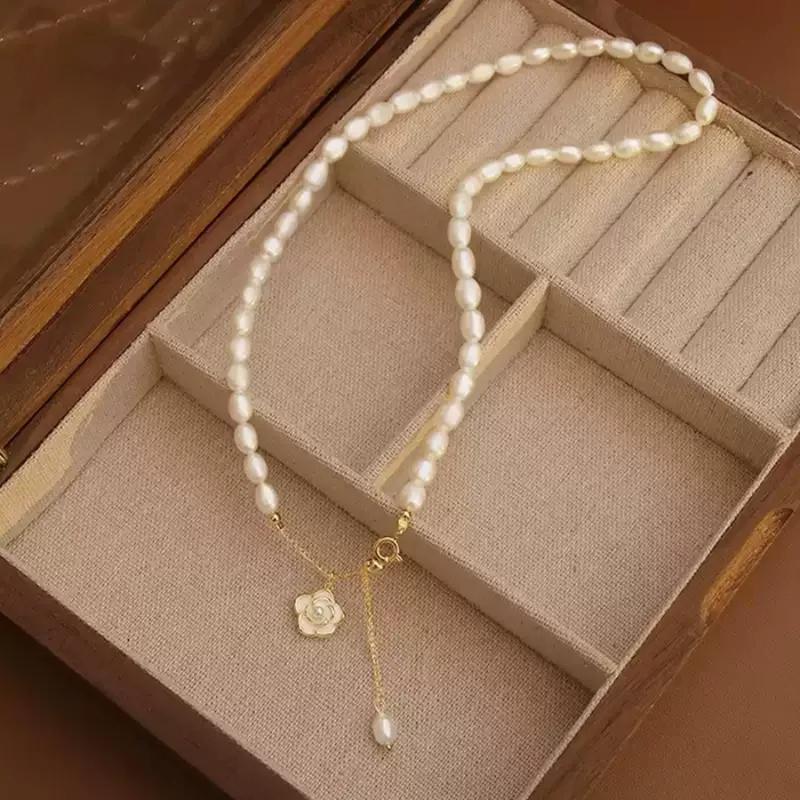 Dây chuyền ngọc trai nuôi nước ngọt mặt hoa trà Chuỗi ngọc trai thật dáng hạt gạo mặt hoa điệu đà 38+7cm