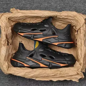 tracy52shop Sepatu olahraga pria hitam dengan oranye desain lubang untuk ventilasi Tahan Pakaian nyaman dipakai soul anti slip cocok untuk berbagai aktivitas olahraga 202603179035