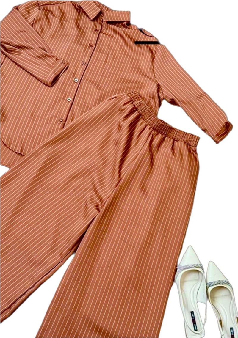 Product Introduction of Cassie Pants Suit. A two-piece pants suit consists of a loose fitting top and a full garters waistband pants, for comfort and flexibility. 8