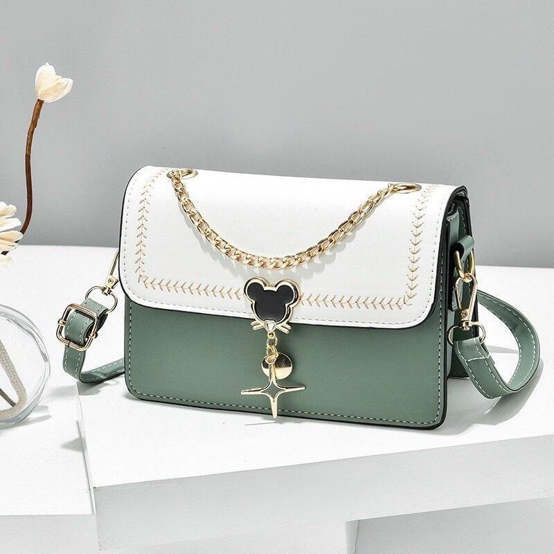 Túi xách nữ đeo chéo đeo vai đen trắng xanh khóa hình chuột Mickey phối dây xích vàng - TXN290