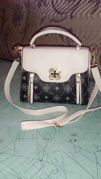 Product Review of Tas Selempang Wanita NewArrival Mini Slimbag Korea Style Kulit WS - CN 04 from y**5 1