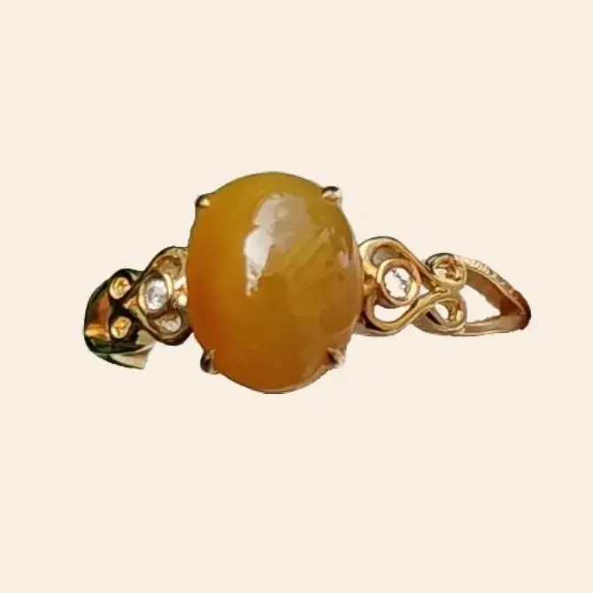 Yellow with a bit reddish Natural Type A Jadeite Jade Cabochon 8.6 * 7 * 3.6 mm set on 18k Gold as Ring adding 2 diamonds with certificate weigh 2.08 grams, finger size 16.8 mm (18kring13)