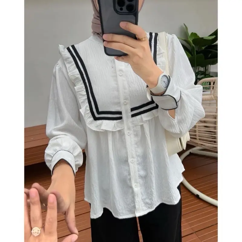 blouse ruffle list hitam kancing aktif/blouse wanita murah/ blouse korean style terbaru/ lengan balon/ kemeja wanita terbaru/ ootd wanita/ fashion wanita Crinkle Cantik Formal Nyaman Panjang 3