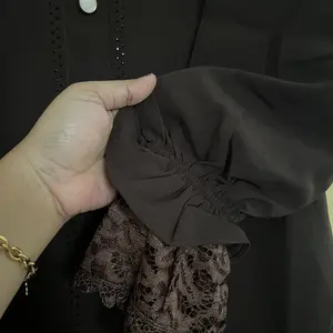Nisyaa Abaya Renda Premium – Elegan Kancing Depan motif marmer