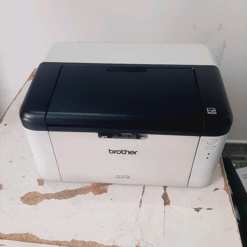 Máy in tích hợp wifi Brother 1211w, rẻ