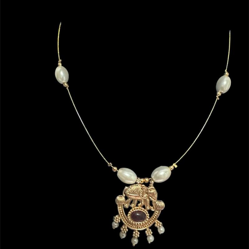 Elephant pendant invisible necklace in ruby with pearls - TikTok Shop ...