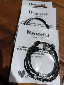 Product Review of Gelang couple Magnet Love Inisial Dadu Hitam Tali Korea 2mm Manik Putih gelang inisial aesthetic from H**💤 0