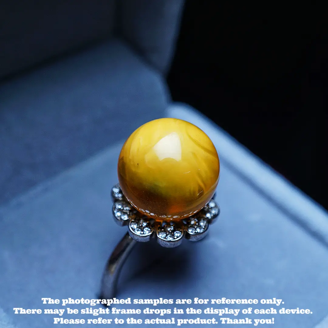 This is a ring made of natural raw ore amber and beeswax.