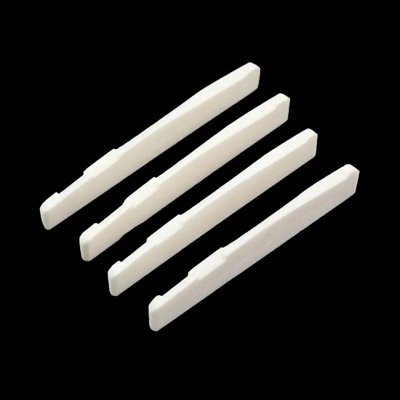 cây cầu xương thực sự yên ngựa cho cây đàn guitar acoustic dân gian…