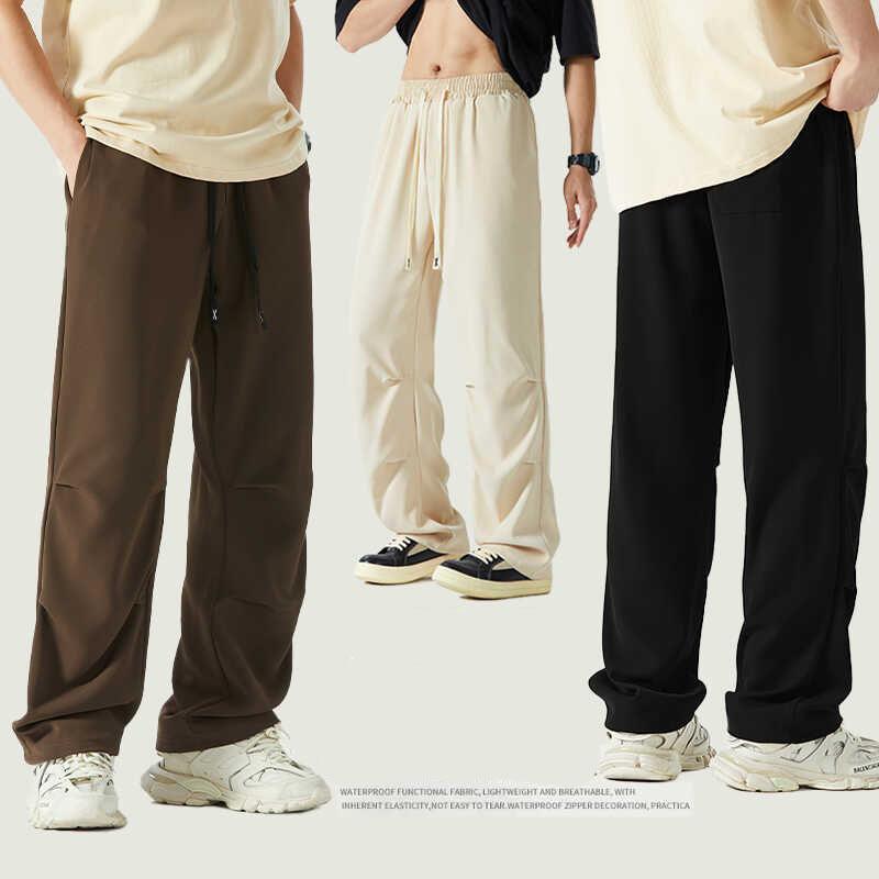 Celana Panjang Unisex Saku Ritsleting Cepat Kering TENCEL Fabric Keren Bernapas Elastisitas