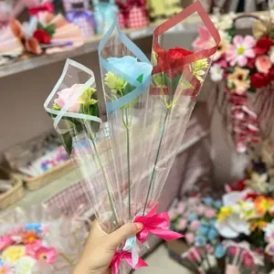 Bunga Tangkai Cantik dengan Kemasan Transparan dan Pita Merah untuk Dekorasi Rumah dan Hadiah artificial