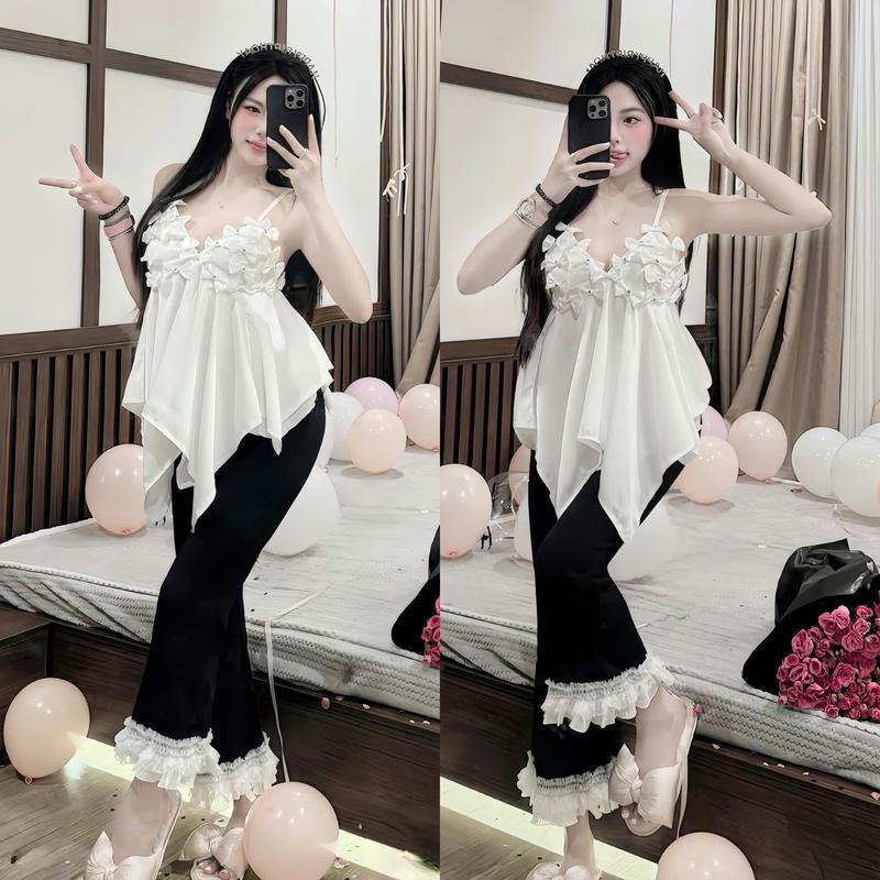 Set đồ nữ áo lụa thiết kế 2 dây đính nơ form rộng kèm quần dài thun ống loe phối chân bèo ren sang chảnh dành cho các nàng diện đi chơi.