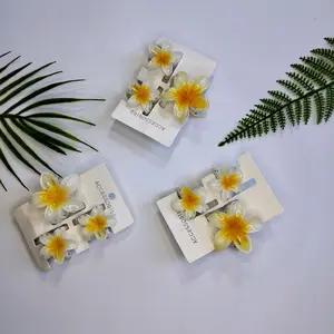 jepit rambut kamboja putih dapet 3 (1besar 2 kecil)