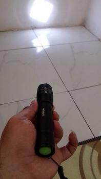 Product Review of Senter Super Terang Waterproof LED Rechargeable Baterai Tactical Anti Air Lampu SWAT Zoom Murah Free Charger from M**i 0