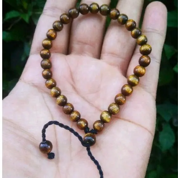 gelang tali arus/akar bahar serat emas .bisa untuk cowok/cewek