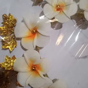 bando kamboja daun shimpony premium khas bali Mahkota Bunga Elegan