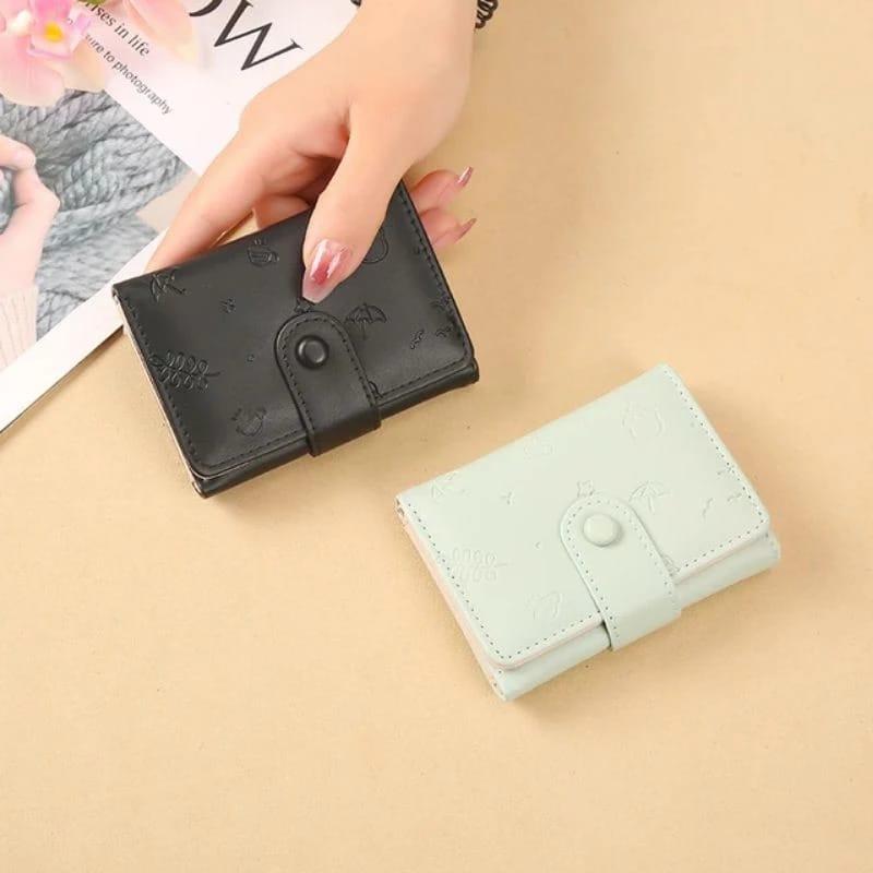 DW-27 Dompet lipat Wanita Mini Motif Embos 2