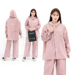 Aimon Jas Hujan Unisex Warna Pastel Setelan Jaket & Celana Tebal Waterproof Parasut PVC 0.25 Elastis dengan Karet Selangkang dan Sablon Logo Menyala