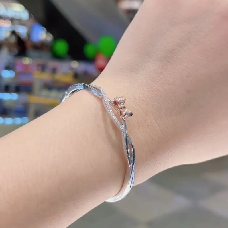 Lắc tay bạc mạ vàng trắng NƠ 2