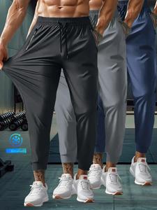 Pantalones deportivos de bolsillo con cremallera de color sólido para hombre, pantalones de cintura elástica de secado rápido transpirables, pantalones casuales cómodos al aire libre para gimnasio, entrenamiento, correr