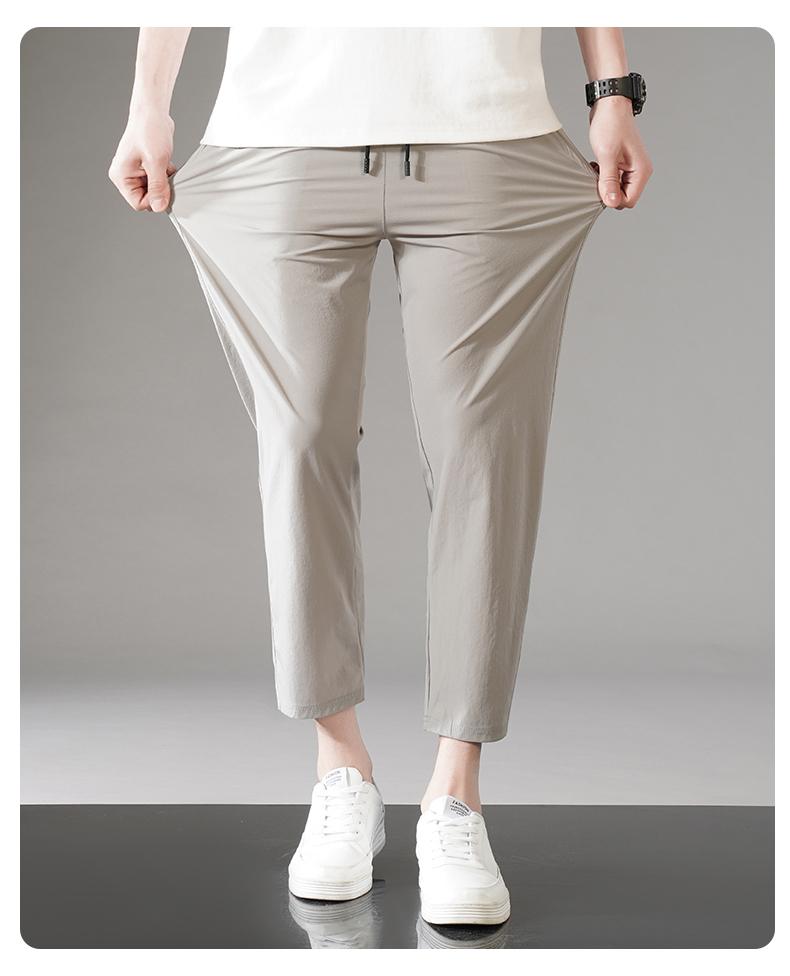 Product Introduction of M-8XL new nylon four-sided elastic summer men's casual sports nine-point pants ice silk small feet men's pants secondary development plus size 19
