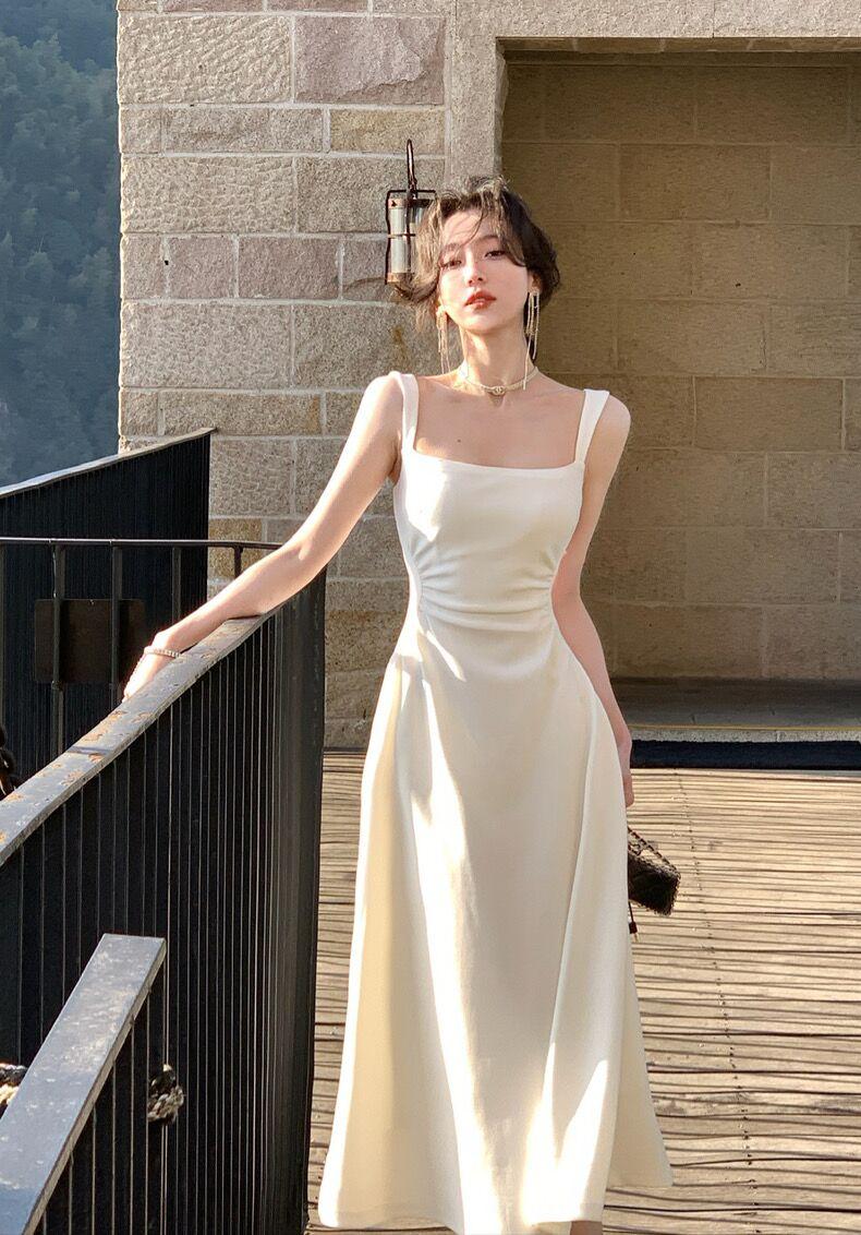 Product Introduction of Women's new slim fit mid length dress, solid color suspender dress, waist cinching, niche design for girls, women's mid length dress Casual Womenswear 7