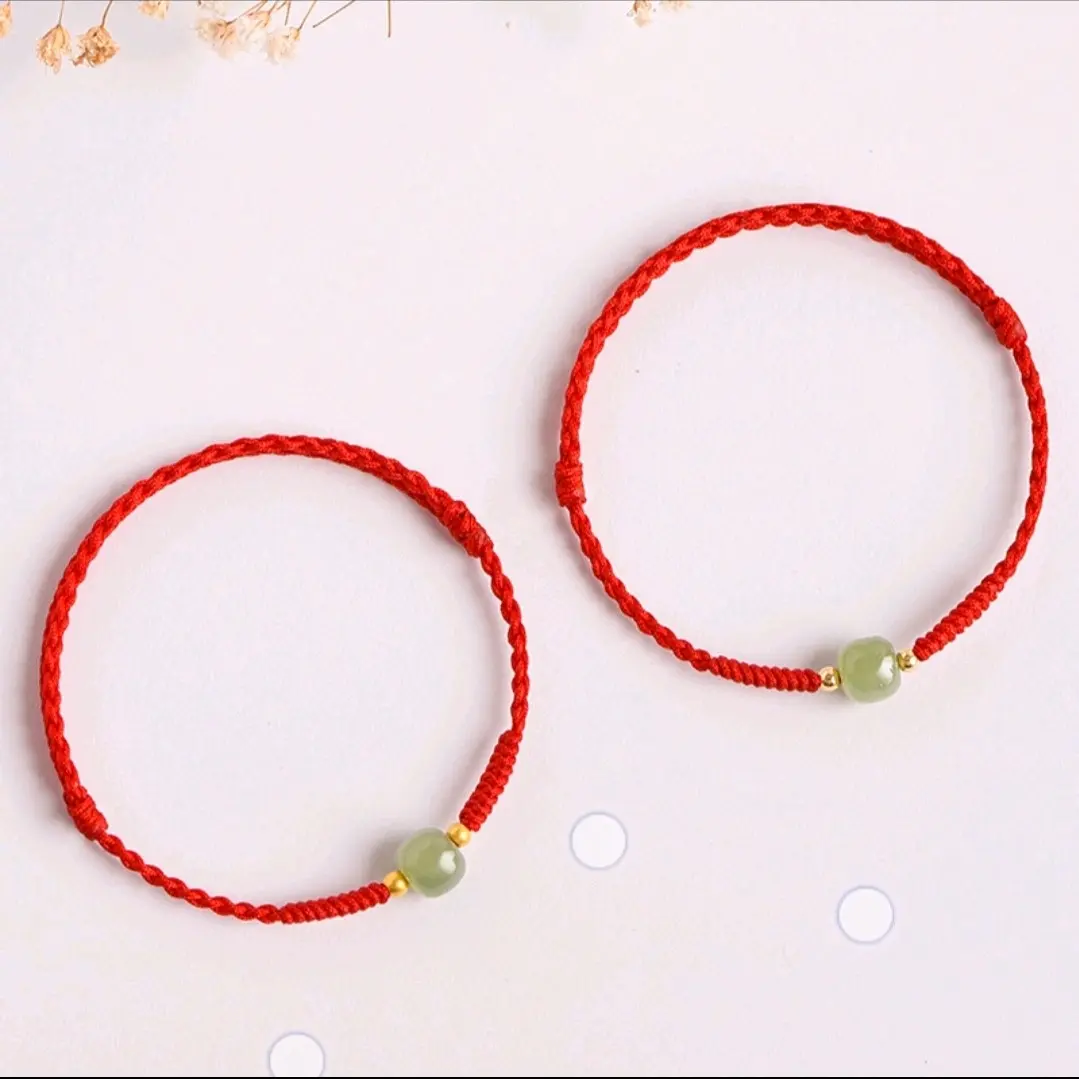 Gelang hoki Batu giok dan manik emas.