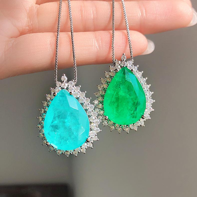 Product Introduction of Micro Inlaid Paraiba Water Drop Gem Necklace Female Ocean Heart Pendant Long Sweater Chain Female 11