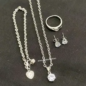 satu set perhiasan wanita silver model mata satu