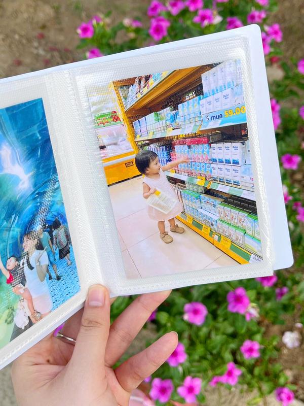  CB 100 ẢNH 9X12 - ÉP NHỰA : Ảnh 9x12 bao ép nhựa hoặc ép lụa  tặng kèm album bìa cứng 100 ô. Lưu trữ kỷ niệm gia đình ảnh cho bé. Ảnh có độ bền màu cao phù hợp in ảnh chụp nhiều người . Size không quá to không quá nhỏ phù hợp mọi loại ảnh 