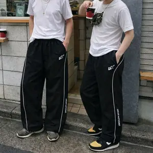 Celana Training Panjang Trackpants Pria Wanita Uniqcloth Sport New Stripe Stylish Adem & Nyaman Harian Keren