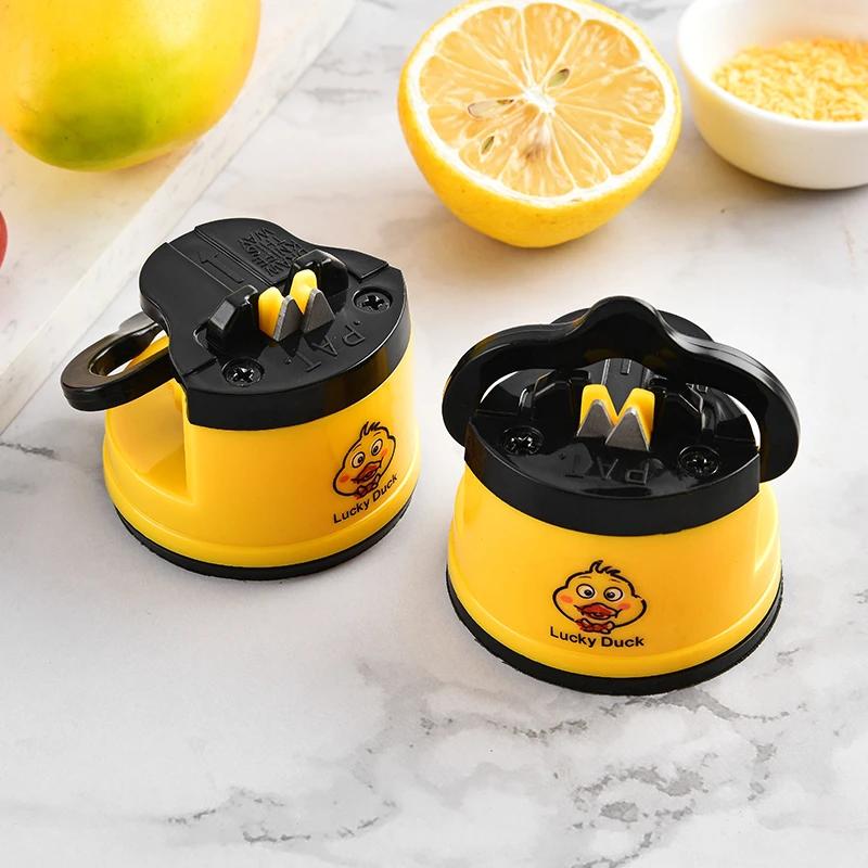 Dụng Cụ Mài Dao Đa Năng, Thiết Kế Vịt Nhỏ Màu Vàng, Dụng Cụ Mài Gia Đình Dễ Thương Và Sáng Tạo, Kiểu Cốc Hút, Cầm Tay, Nhanh Chóng, Và Cung Cấp Độ Cứng Cực Tốt 0