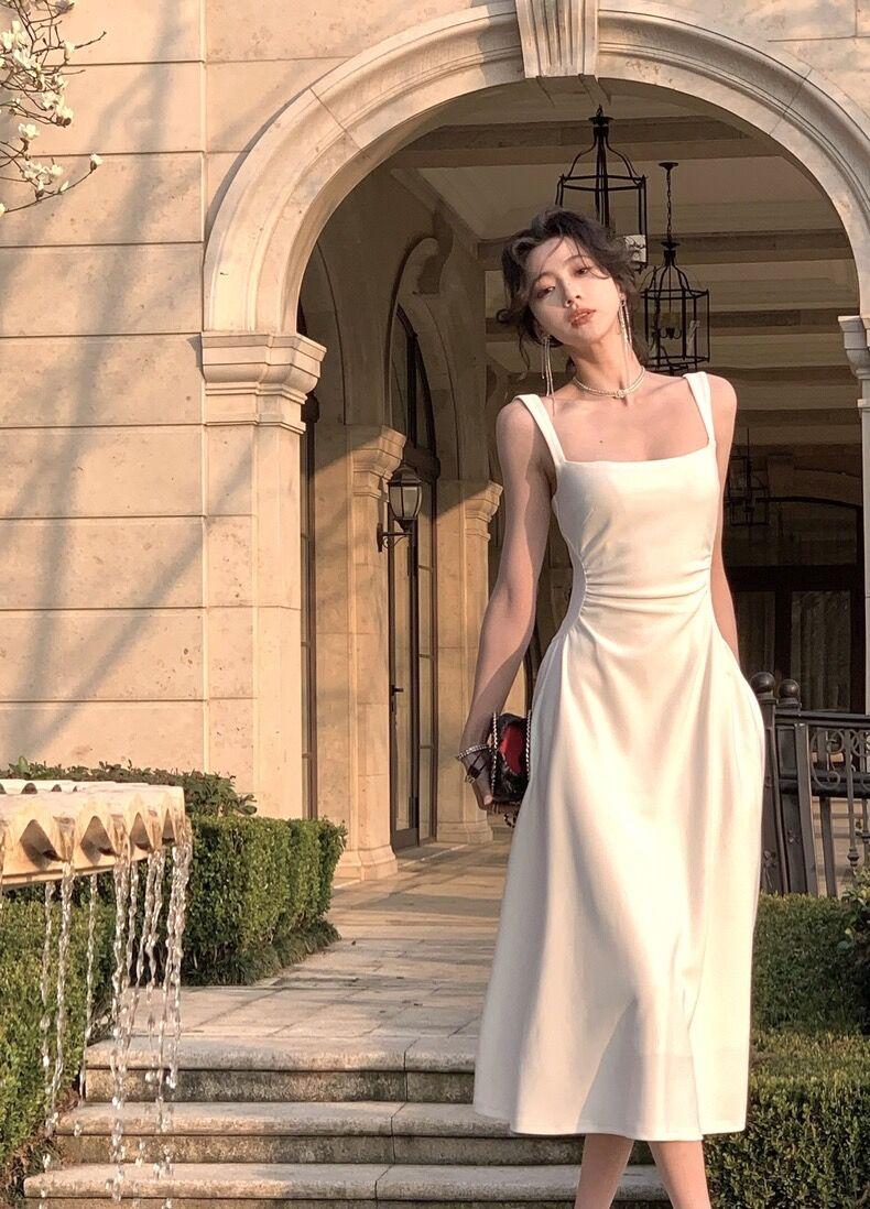 Product Introduction of Women's new slim fit mid length dress, solid color suspender dress, waist cinching, niche design for girls, women's mid length dress Casual Womenswear 19