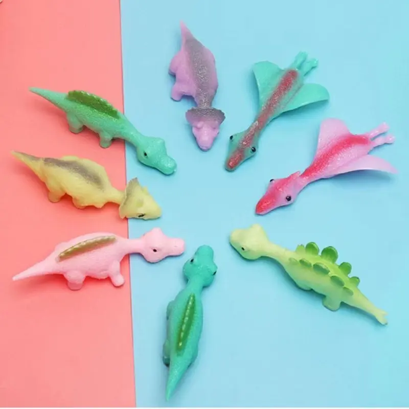 Slingshot Dinosaur Fun Toy Finger Dart Launching Little Dinosaur Decompression Softrubber 6