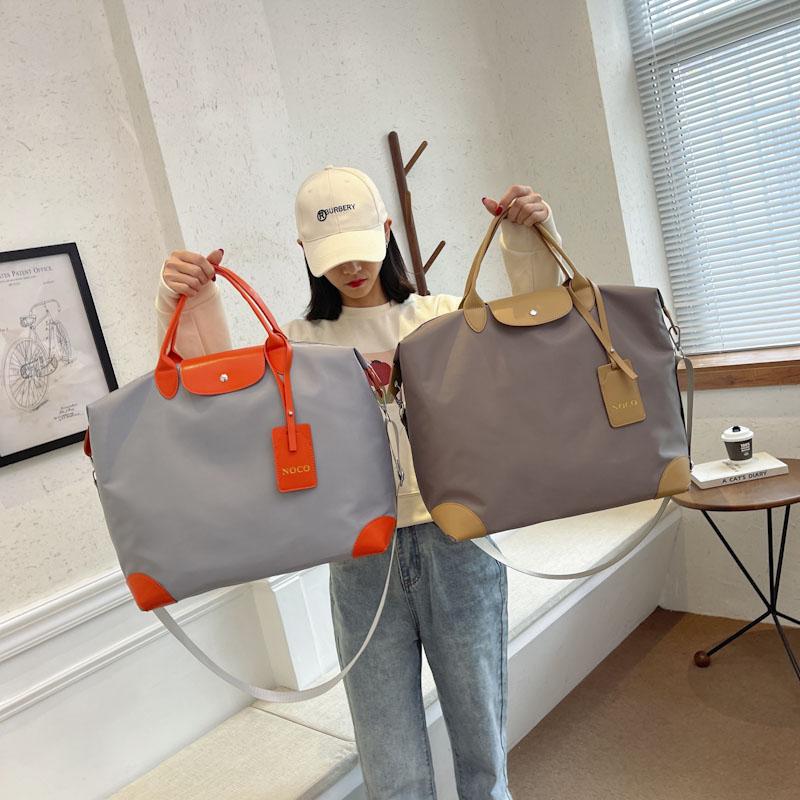 Product Introduction of 2023 Large Capacity Women's Travel Bag Waterproof Sports Gym Bag Outdoor Shoulder Crossbody Bag Female Handbag Weekend Gym Bag 1