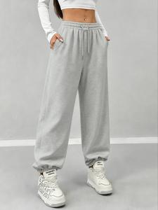Pantalones jogger de mujer de color sólido con bolsillo en la cintura, cómodos y gruesos pantalones deportivos largos para otoño e invierno, diseño deportivo de corte holgado