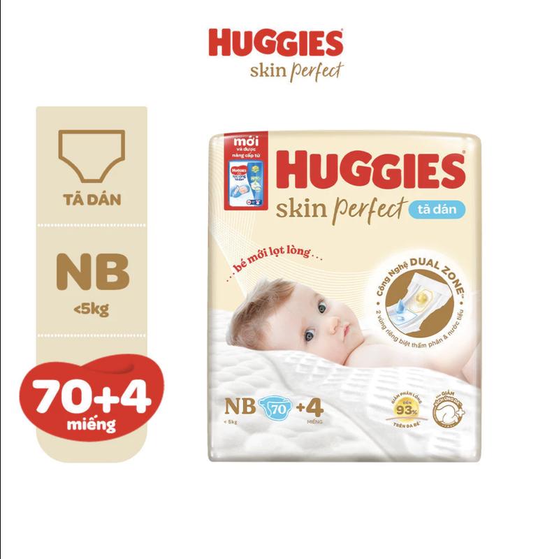 Huggies Tã dán Skin Perfect cho bé sơ sinh NB70+4 S54+4 hai vùng thấm hút giảm kích ứng mềm mại ngừa hăm hiệu quả