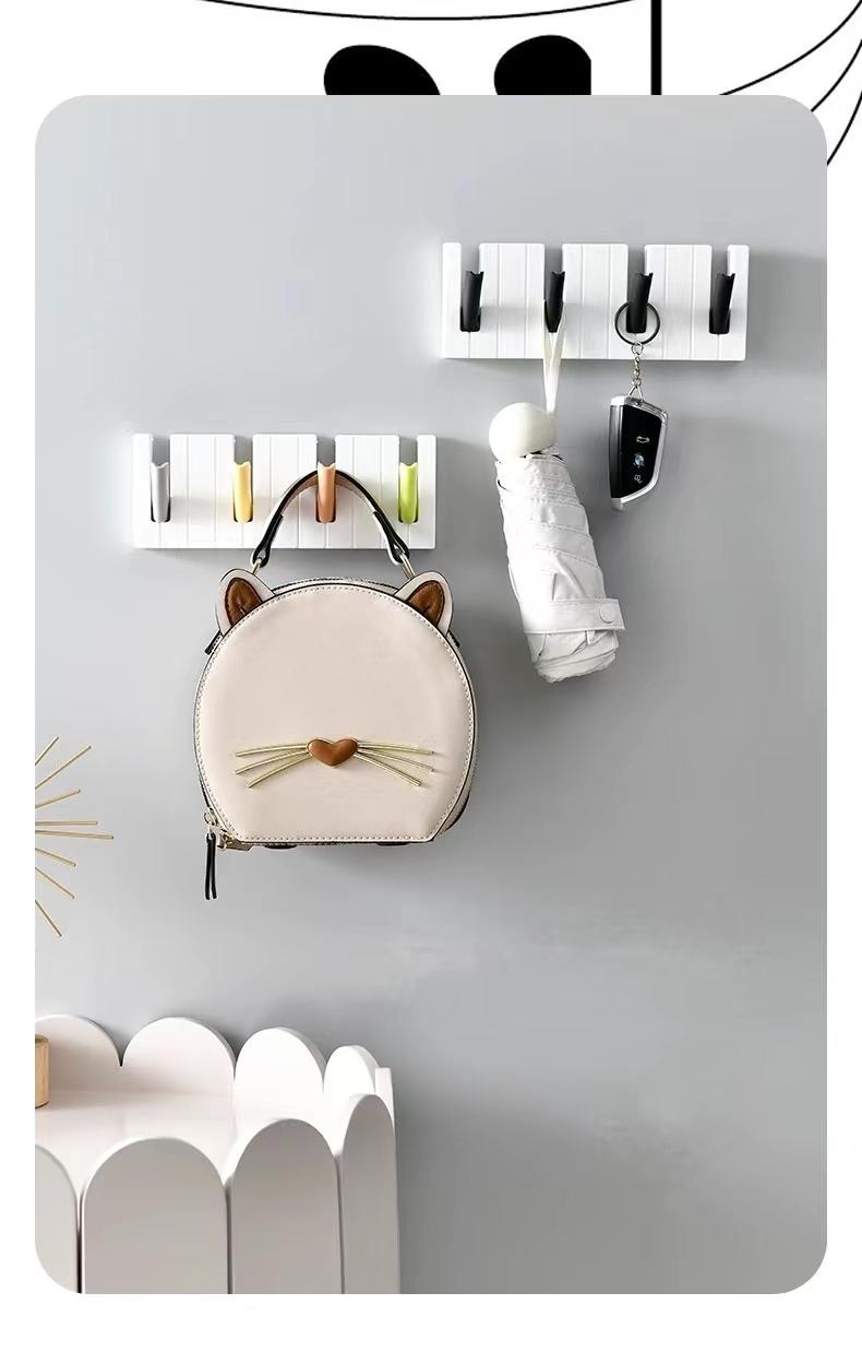 Product Introduction of Creative four-grid piano-shaped hook without punching holes, entrance key, hat, coat and bag hanger, kitchen and bathroom storage rack. Organiser Hangable 0