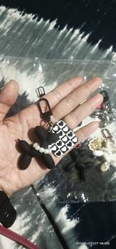Product Review of Gantungan Kunci Anjing Balon Hitam Liontin Kotak-kotak Gantungan Kunci Pasangan Liontin Tas Wanita from W**🍒 0
